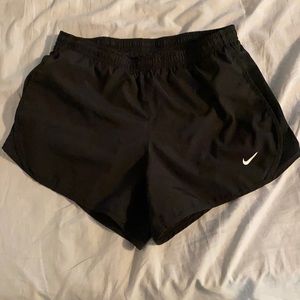 Black Nike running shorts